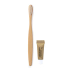 Set dentaire avec brosse à dents et dentifrice. Brosse à dents fabriquée en bambou. Dentifrice inclus avec bouchon à vis.