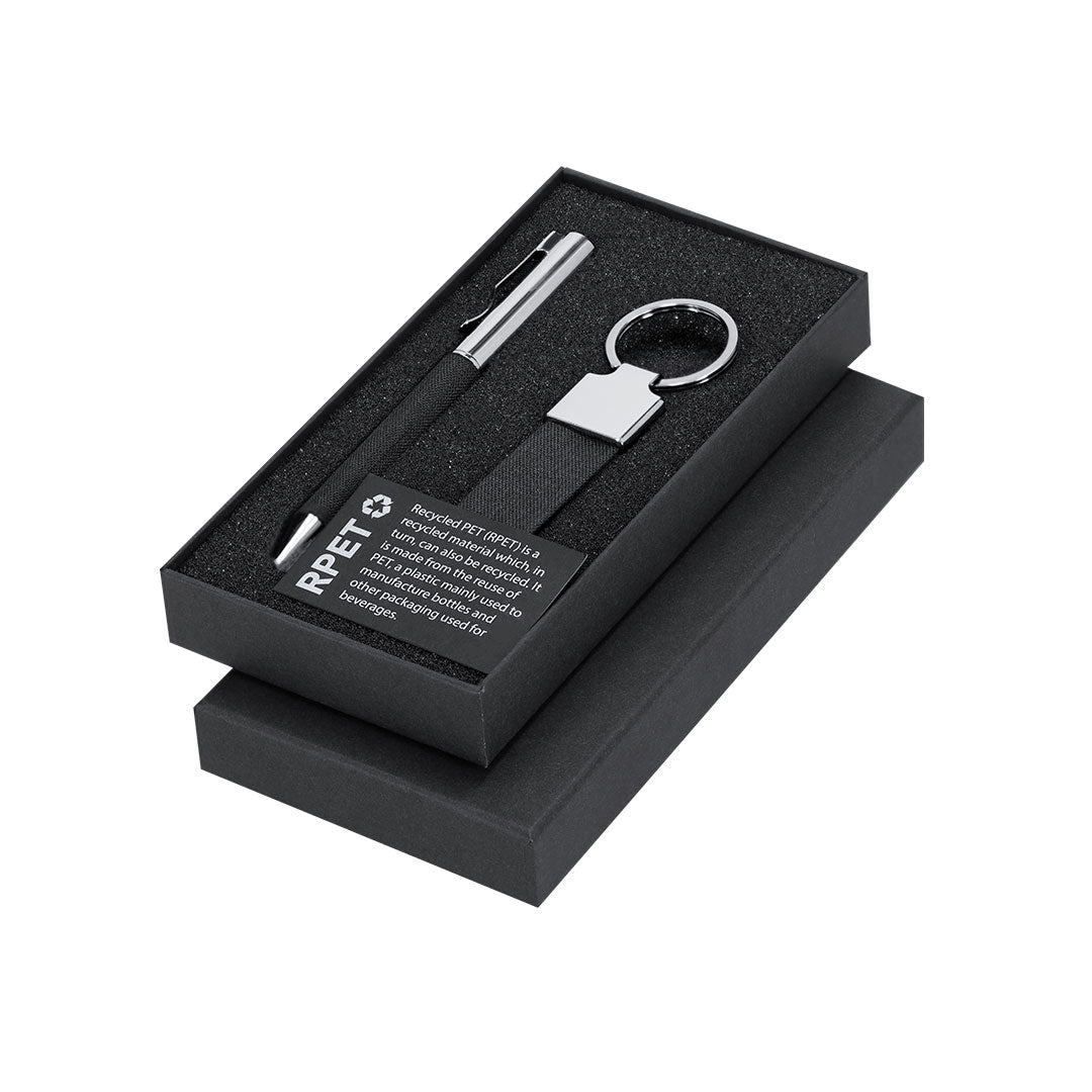 Coffret stylo encre bleue et porte-clés noire en métal en RPET, présenté dans une boîte individuelle noire
