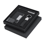 Coffret stylo encre bleue, porte cartes et porte-clés noire en métal en RPET, présenté dans une boîte individuelle noire