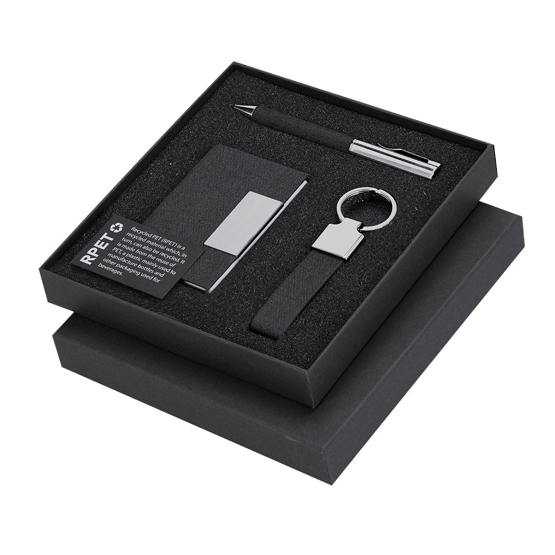 Coffret stylo encre bleue, porte cartes et porte-clés noire en métal en RPET, présenté dans une boîte individuelle noire
